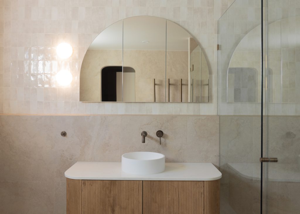 White Countertop and a Vessel Sink