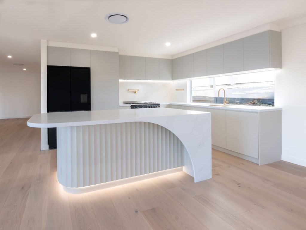 Modern Kitchen with a Large, White Kitchen Island